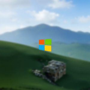 Microsoft logo over a blurred grassy hill background, symbolizing the open-sourcing of GitHub Copilot and Windows Subsystem for Linux (WSL) to advance AI-driven coding tools.